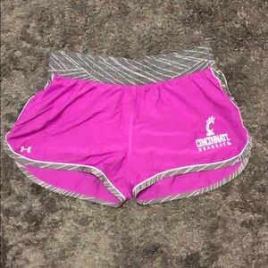 Purple Under Armour running shorts